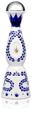 Front view of the hand-painted Clase Azul Reposado Tequila ceramic decanter showing the agave-blue floral pattern and metallic stopper