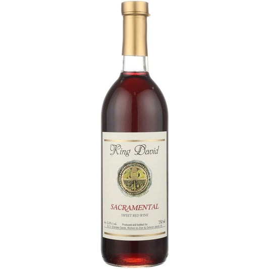 King David Sacramental sweet red kosher wine in a clear 750ml bottle with deep red wine, gold foil cap and a cream label with a gold seal