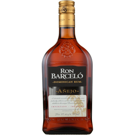 A bottle of Ron Barcelo Anejo 80 rum with a amber tinted liquid visible through the glass. The label displays the brand and product name, indicating it is a product of the Dominican Republic.