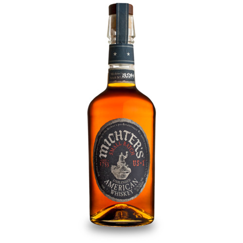 Michter's US-1 Unblended American Whiskey in a tall clear glass bottle of amber whiskey with a blue foil neck and an oval slate-blue label reading Michter's Small Batch Unblended American Whiskey