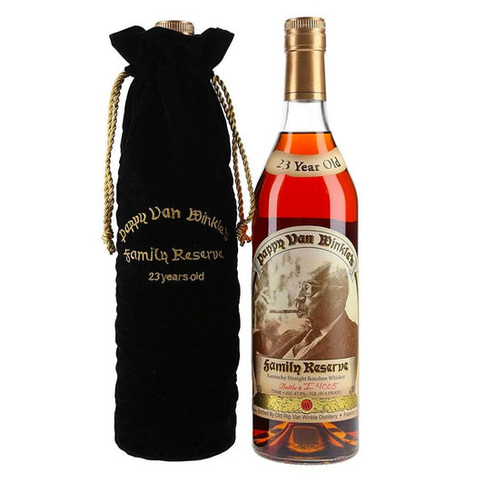 Pappy Van Winkle's 23 Year Old Family Reserve Kentucky Straight Bourbon bottle of amber whiskey beside its black velvet drawstring bag embroidered in gold
