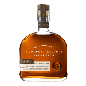 Woodford Reserve Double Oaked Kentucky Straight Bourbon Whiskey in a rounded clear glass bottle of deep amber bourbon with a brown cap and a cream Double Oaked label